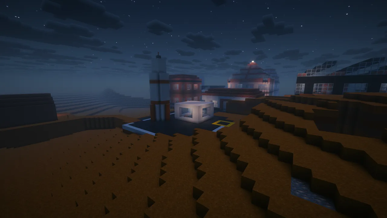 Real in-game screenshot with a shader pack: the Mars refuge and its rocket at night on dark terraced ground.