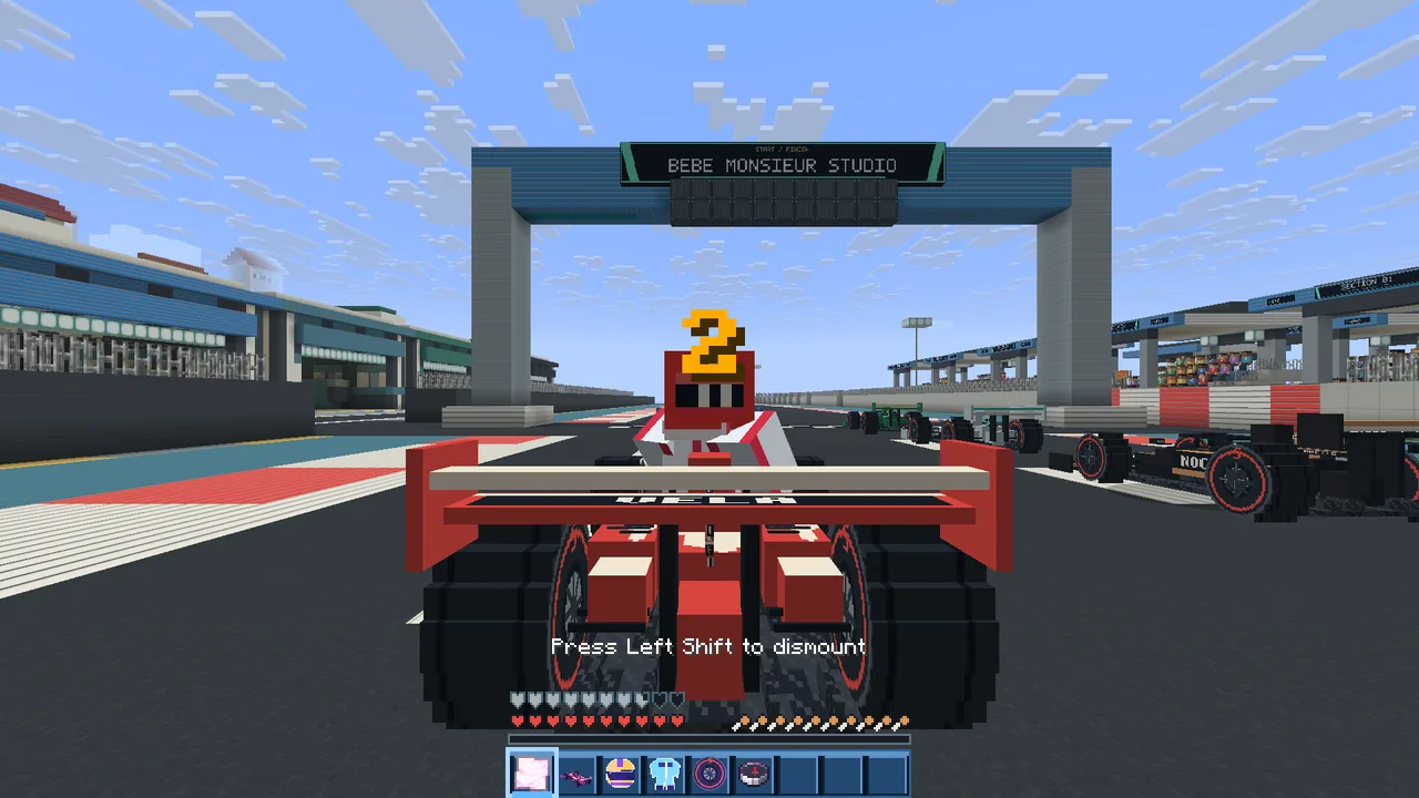 Real playtest screenshot: the cars lined up on the starting grid, the countdown on screen.
